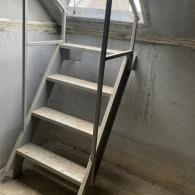In ground storm shelter stairs 